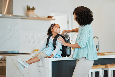 Buy stock photo Mother, girl and packing bag for lunch, food and nutrition, wellness and development for morning school. African mom, lunchbox and backpack of child for healthy diet, care and happy in home kitchen