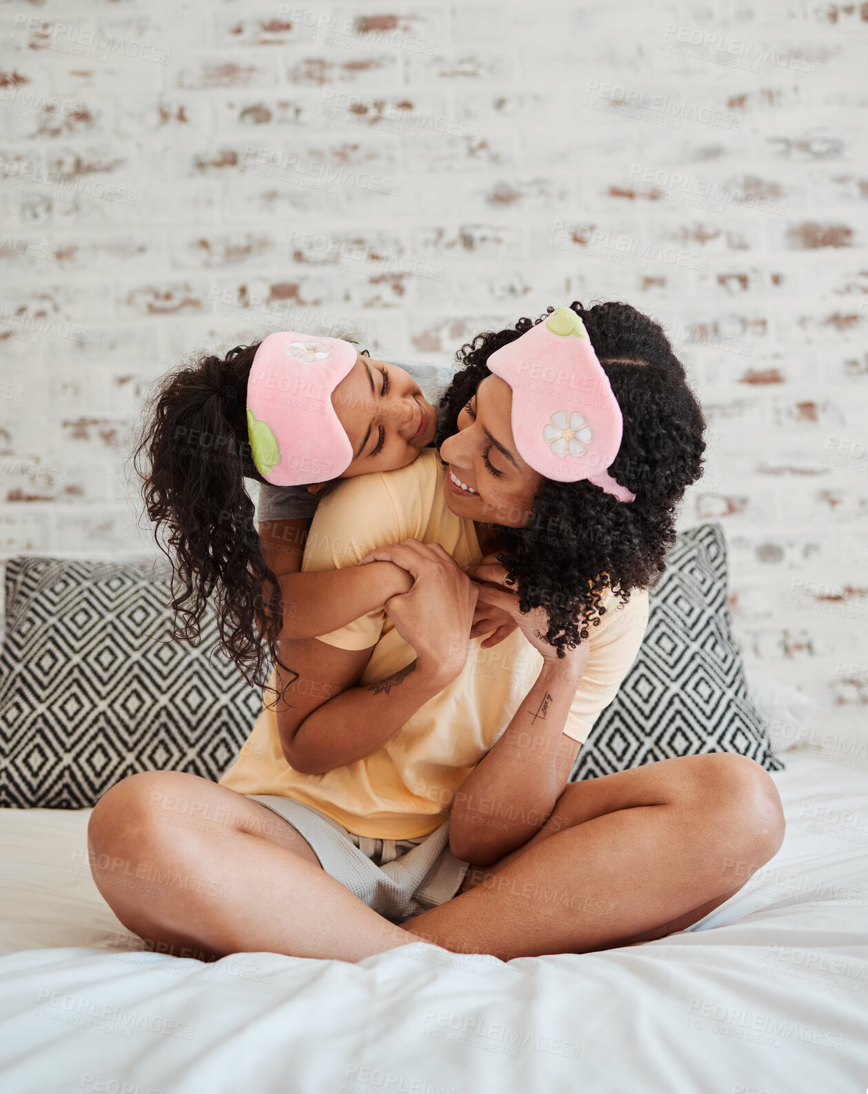 Buy stock photo Love, mother and kid with hug in bedroom or happiness in home for quality time with care. Woman, child and embrace in morning with bonding or affection with girl in apartment to relax or comfort.