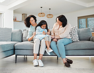 Buy stock photo Funny, tickling and mother with kid, grandmother and bonding together in home. Love, happy and mom with grandma, girl and child on sofa in lounge, play game and laughing with family on couch in house