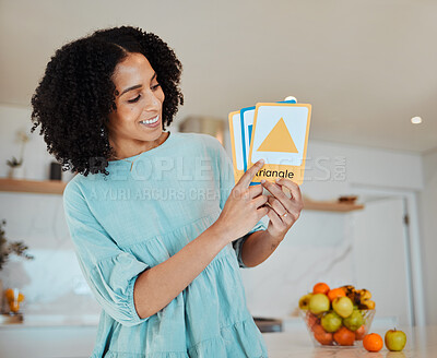 Buy stock photo Learning, education and cards with a happy mother in her home for teaching, growth or development. Smile, school and a female parent or tutor in the kitchen for a private lesson on shape or color