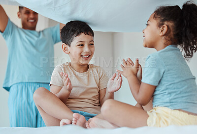 Buy stock photo Children, play and family with blanket at bed, bonding or smile together to relax. Applause, kids game and father in bedroom with sheet for patty cake, happy and enjoying quality time in house