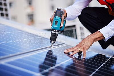 Buy stock photo Solar panels, person hands and tools for engineering maintenance, electrical repair and rooftop contractor, Grid, drill and industrial worker or electrician for eco photovoltaic installation in city