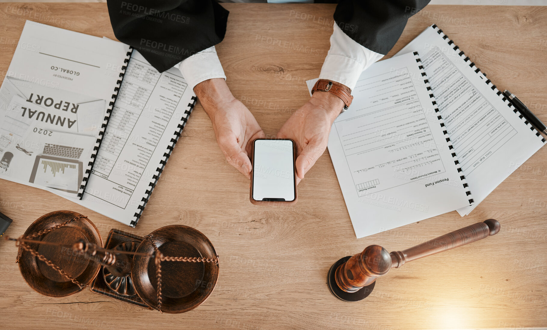 Buy stock photo Judge hands, phone and person reading attorney communication, advertising space or contact law firm consultant. Lawyer, cellphone mockup and top view advocate work on legal, contract or policy update