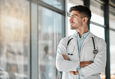 Buy stock photo Doctor, thinking and arms crossed at the window in hospital, clinic and vision for the future of healthcare, medicine or surgery. Man, medical worker or intern with decision, choice and ideas