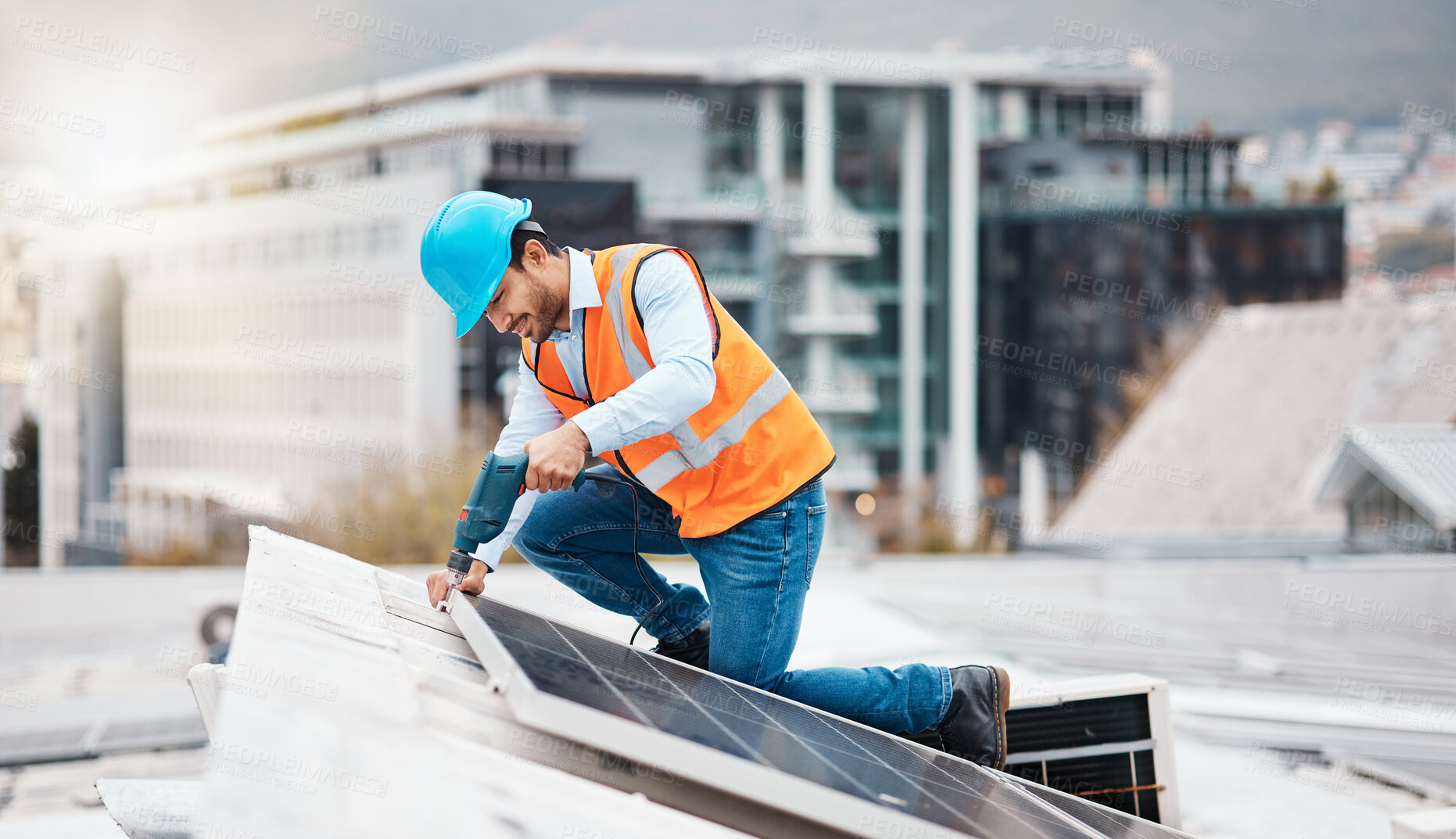 Buy stock photo Solar panel, drill and engineering with man on roof top for renewable energy, project and power. Construction, electricity and sustainability with contractor in city for tools, photovoltaic and grid