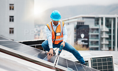 Buy stock photo Technician man, drill and solar panel on roof with installation, sustainability and construction in city. Engineer, tools and photovoltaic system with building, development or renewable energy in cbd