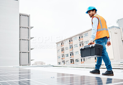 Buy stock photo Solar panel, tool box and engineering with man on roof top for renewable energy, project or power. Construction, electricity or technician with contractor in city for inspection and photovoltaic grid