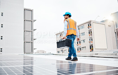 Buy stock photo Solar panel, tool box and electricity with man on roof top for renewable energy, project or power. Construction, engineering or technician with contractor in city for inspection and photovoltaic grid