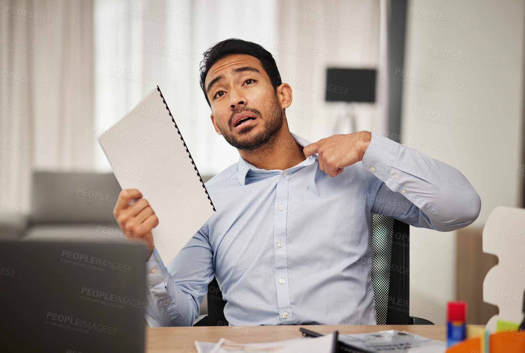 Buy stock photo Hot, heat and businessman with stress due to debt and shocked fan with paperwork and is sweaty in home office. Remote work, tired and frustrated employee with burnout or anxiety feeling overworked