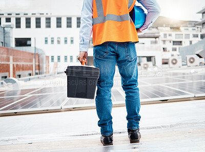 Buy stock photo Tool box, construction worker and back with solar panel maintenance and labor outdoor. Roof, eco engineer and green energy project with builder and sustainability contractor with building project