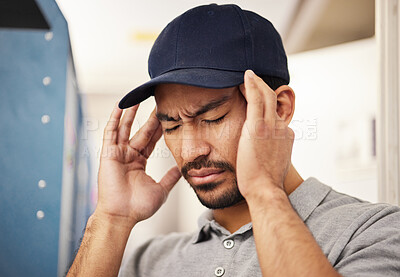 Buy stock photo Stress, courier and headache pain from delivery, logistics burnout and anxiety from a ecommerce. Depression, mental health and sad Asian worker or commercial worker with a migraine from shipping