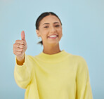 Happy woman, portrait and thumbs up for good job, approval or winning against a studio background. Female person smile with like emoji, yes sign or OK for agreement, thank you or positive feedback