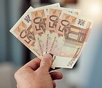Investment, hands and money fan of euros for banking, trading paper bills and economy of financial freedom. Closeup of rich investor, profit and income of bonus, cash savings or wealth of accounting
