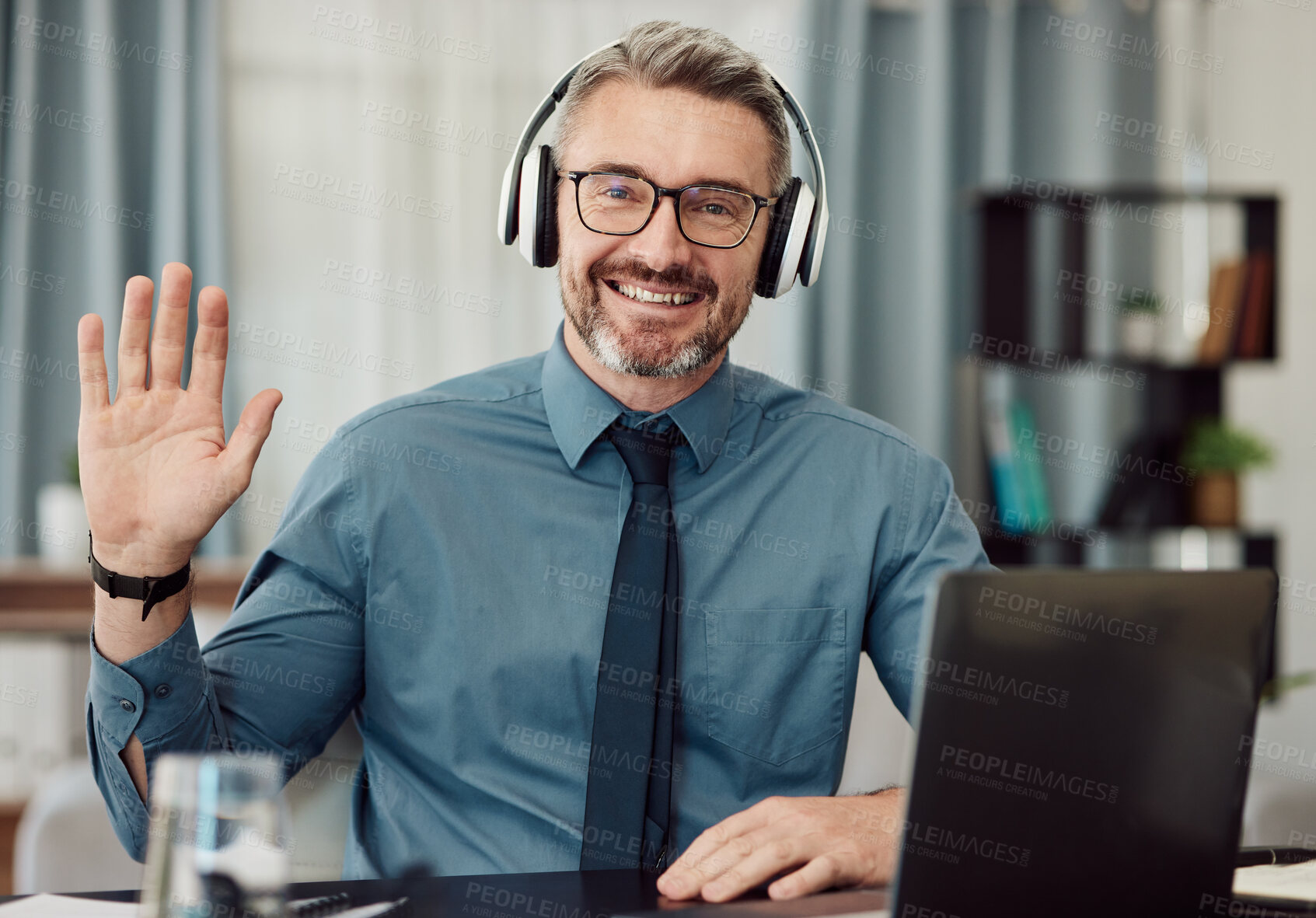 Buy stock photo Portrait, headphones and man wave on video call for business smile in online chat at home. Happy face, hello and webinar of mature manager with glasses in virtual meeting for remote work on laptop