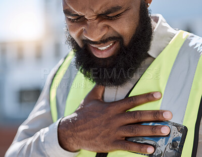 Buy stock photo Stress, construction worker and a black man with a heart attack in the city. Healthcare, burnout and an African builder, architect or handyman with anxiety, chest pain or medical emergency on site