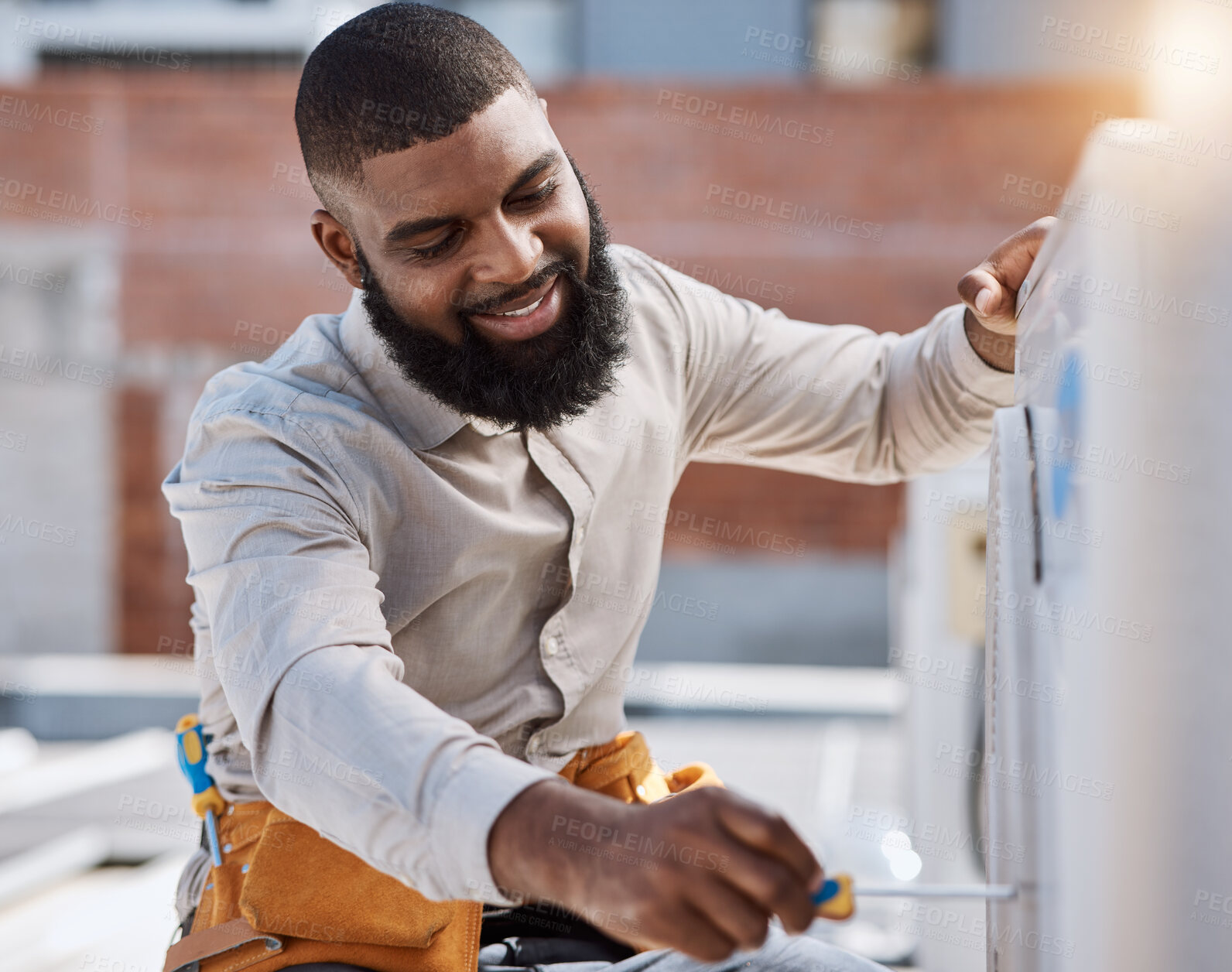 Buy stock photo Building, engineer and air conditioner install with a black man on a roof for construction or manual labor. Industrial, engineering and an electrician working on ac repair for maintenance or service