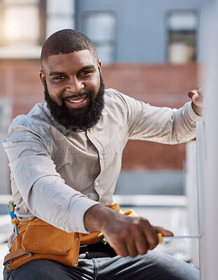 Buy stock photo Portrait, engineer and air conditioner install with a black man on a roof for construction or manual labor. Building, engineering and an electrician working on ac repair for maintenance or service