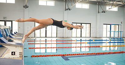 Buy stock photo Swimming, fitness and woman dive in pool for exercise, training and workout for competition in gym. Water sports, diving and female swimmer jump on podium block for race, challenge and performance