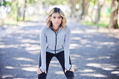 Buy stock photo Fitness, exercise and portrait of a woman outdoor at a park with commitment and focus on wellness. Young female person on a road in nature for a break or rest after workout, running or training