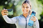 Runner woman, selfie and smile in park for memory, blog update or post with exercise, fitness or training. Influencer girl, happy and photography for wellness, health or workout on social network app