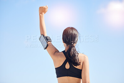 Buy stock photo Woman, fitness and fist pump in achievement for winning, workout success or outdoor exercise. Rear view of female person in celebration for accomplishment or training with sky background on mockup