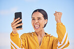Happy woman, phone and winning in celebration for good news, success or outdoor sale promotion. Excited female person with fist pump in happiness for lottery, discount or prize on mobile smartphone
