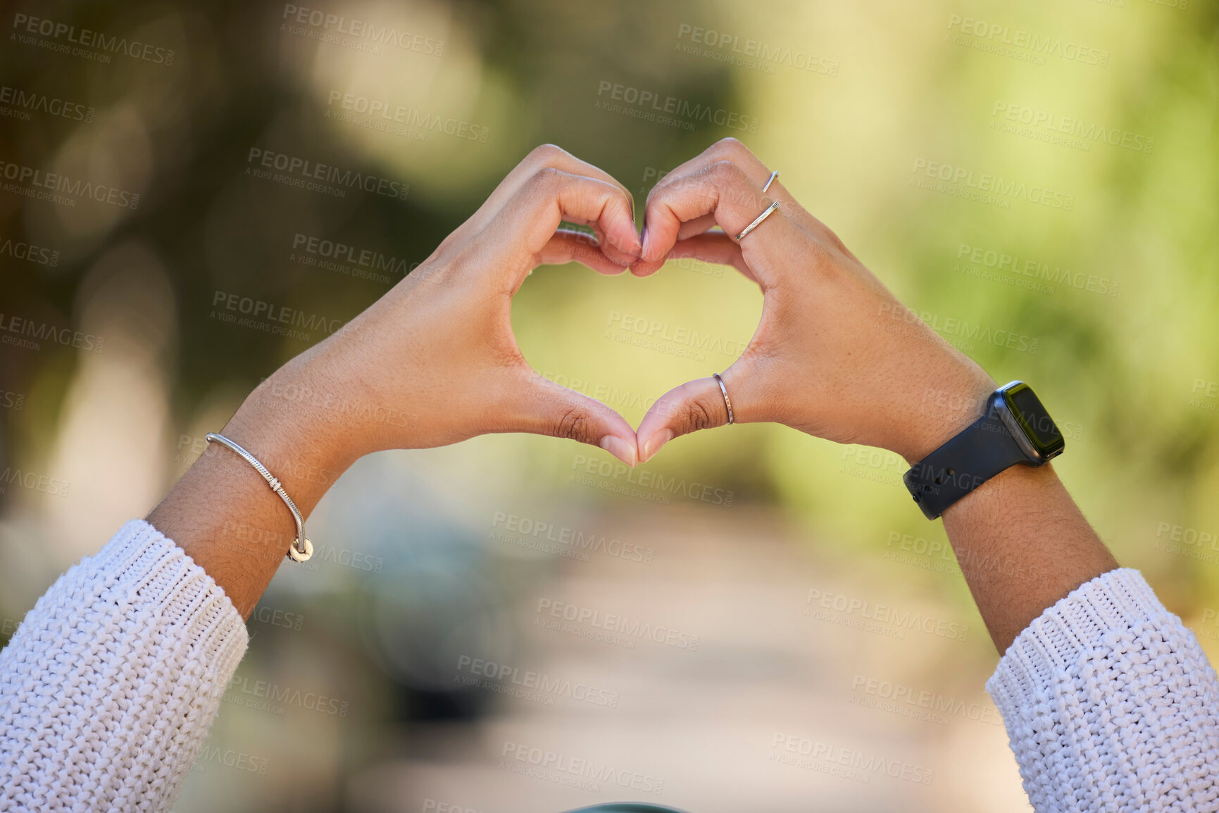 Buy stock photo Heart, love and hands of woman in park for support, health and kindness symbol. Peace, emoji and motivation with closeup of person and gesture in nature for empathy, trust and valentines day