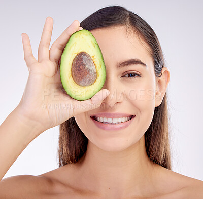 Buy stock photo Face, skincare and woman smile with avocado for beauty cosmetics isolated on a white background in studio. Portrait, happy and natural model with fruit food for nutrition, healthy diet or wellness