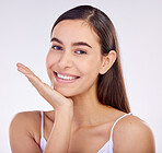 Face, skincare hand and beauty of woman with smile isolated on a white background in studio. Portrait, happy and natural model with cosmetics in spa facial treatment, aesthetic or wellness for health