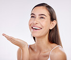 Skincare, advertising and face of woman on a white background for wellness, beauty products and cosmetics. Dermatology, mockup and happy female person with hand gesture for hygiene, makeup and salon