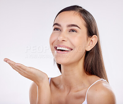 Buy stock photo Skincare, advertising and face of woman with palm for wellness, beauty products or cosmetics. Dermatology, mockup and female person with hand gesture for natural health on white background in studio