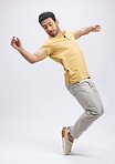 Dance, movement and man on toes in studio for freedom, energy and performance. Creative, training and isolated male person balance, moving and in action pose for dancing mockup on white background