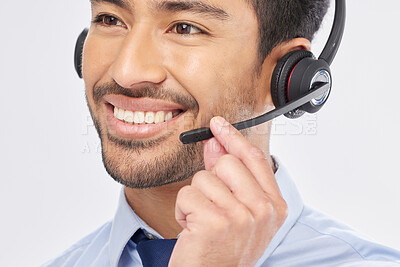 Buy stock photo Face, smile and headset with a call center man in studio on a white background for customer service or support. Contact us, crm and consulting with a happy male employee talking for assistance