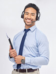Call center, portrait and Asian man with documents for telemarketing, crm support and consulting isolated on a white studio background. Face, smile and sales agent with paperwork for customer service