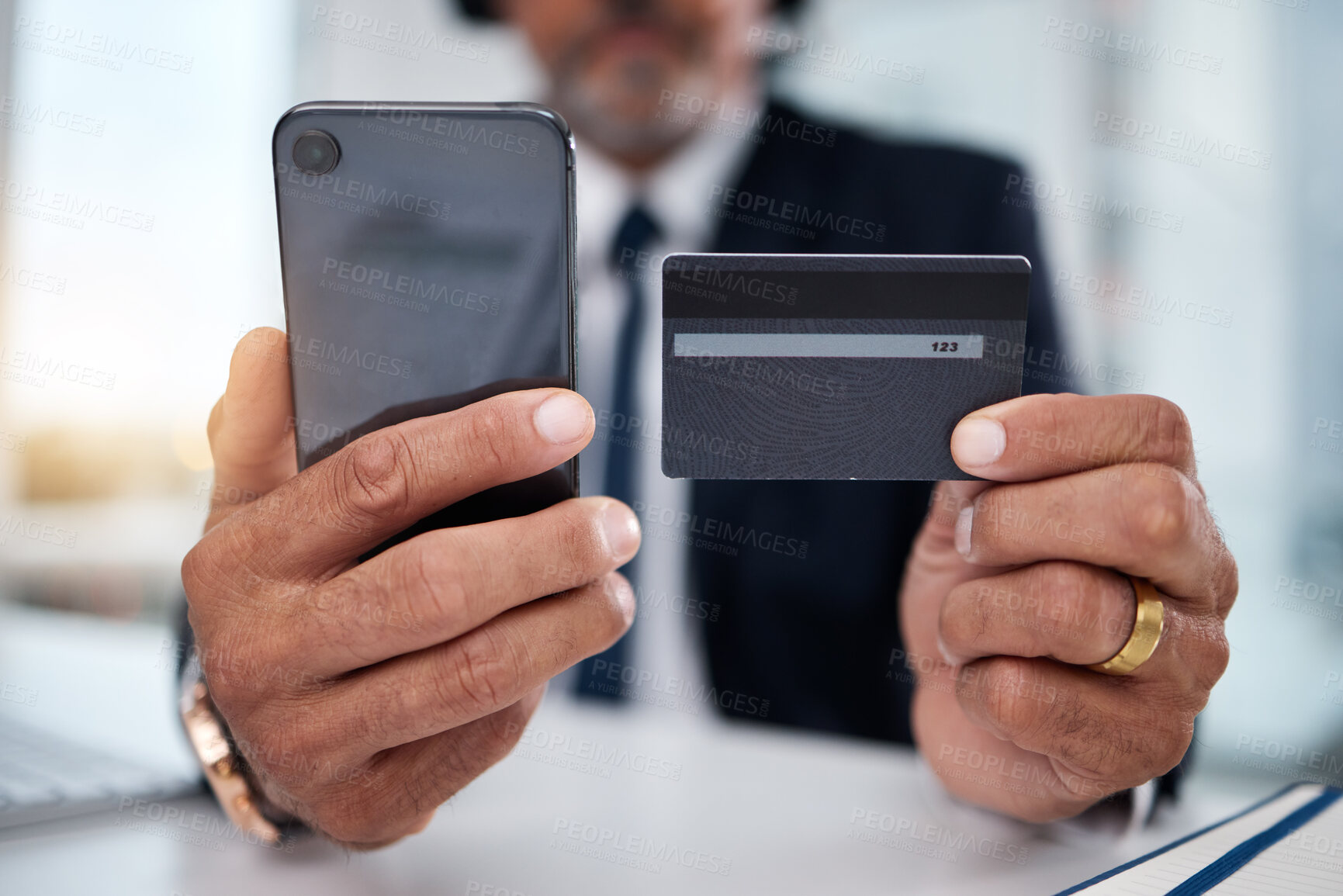 Buy stock photo Hands, phone and credit card man in office for payment, ecommerce or budget for shopping in call center. Consultant, crm and banking in closeup for loan, fintech or bills in telemarketing workplace