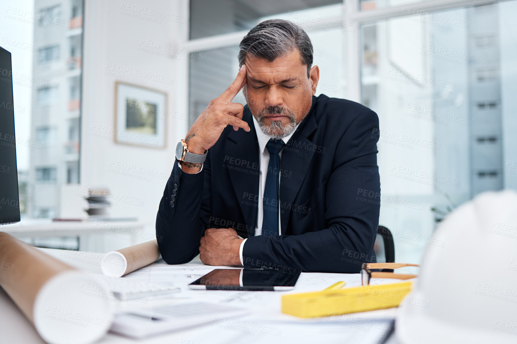 Buy stock photo Frustrated, tired and architect man in an office with a design problem, mistake or deadline for project. Mature male engineer stress about headache, fatigue or crisis in construction industry