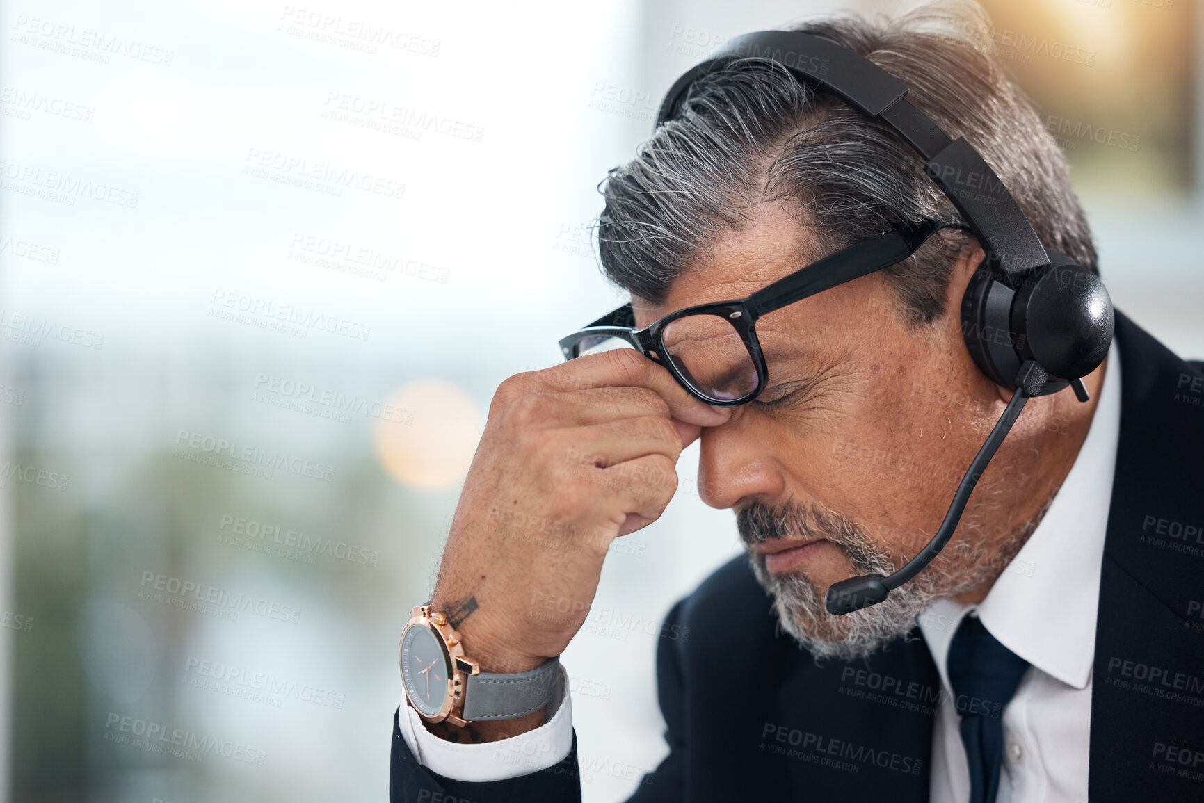 Buy stock photo Stress, sales and man in a call center with a headache from telemarketing or technical support. Sad, fail or a mature customer service employee or boss with a mistake or problem with communication