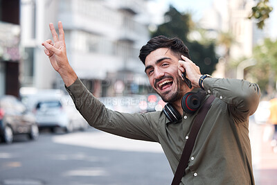 Buy stock photo Man, phone call and wave for taxi, city and smile for peace sign language, emoji or funny face on sidewalk. Young entrepreneur, smartphone and street to stop bus, transportation and driver for travel