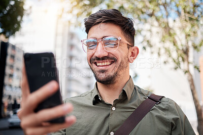 Buy stock photo Phone, city and happy business man online for planning, social media and network in town. Travel, professional and face of male worker on smartphone for communication, website and search on commute