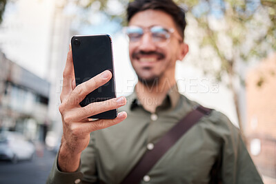 Buy stock photo Phone, city and hand of business man online for chat, social media and network in town. Travel, professional and closeup of male worker on smartphone for communication, website and search on commute