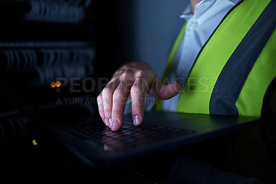Buy stock photo Engineering, night and hands of person on laptop for maintenance, repair and inspection in server room. Information technology, dark and IT technician on computer for analysis, data and control panel