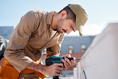 Buy stock photo Technician man, drill and outdoor with air conditioner maintenance, roof or building in metro cbd for construction. AC repair, hvac tech and tools for engineer, service and aircon industry on rooftop