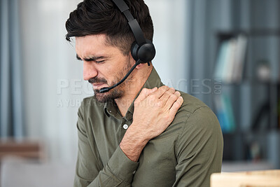 Buy stock photo Call center man, shoulder pain and stress in office, communication expert or consultant with emergency. Young telemarketing agent, crm and muscle injury with accident, problem or fatigue in workplace