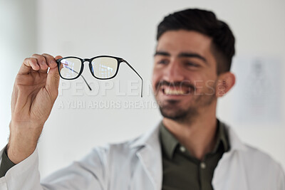 Buy stock photo Hands of man, doctor and optician with glasses for vision, eyesight and prescription eye care. Happy optometrist check frame of lens for eyewear, test and consulting for optical healthcare assessment