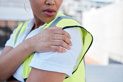 Buy stock photo Woman, engineer and hands with shoulder pain outdoor from injury, accident and muscle tension on rooftop. Closeup of female contractor with sore arm, ache and joint inflammation at construction site