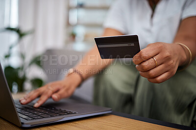Buy stock photo Woman, laptop and hands with credit card in ecommerce, payment or fintech banking on sofa at home. Closeup female person or shopper with debit on computer app in online shopping, purchase or buying
