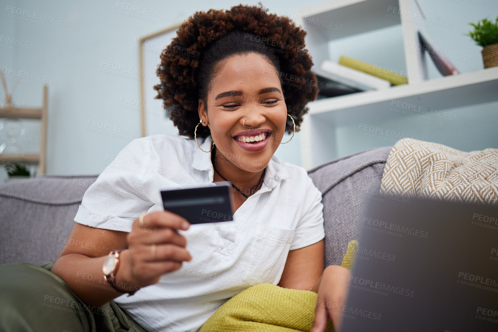 Buy stock photo Happy black woman, laptop and credit card for online shopping, payment or banking on sofa at home. African female person or shopper smile with debit on computer app for ecommerce, purchase or buying