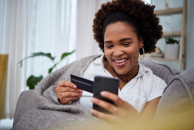 Buy stock photo Happy black woman, phone and credit card for ecommerce, payment or fintech banking on sofa at home. African female person or debit shopper on mobile smartphone app in online shopping, purchase or buy