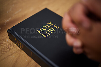Buy stock photo Bible, hands and woman in prayer in home, lounge and reading book of faith, religion and worship study for mindfulness. Person, praying and studying holy book for peace, praise and meditation