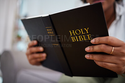 Buy stock photo Hands, bible and woman reading in home, lounge and book of prayer, religion and worship faith in study of mindfulness. Person, praying and studying holy books for peace, praise and meditation